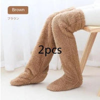 Mandotos cozy winter knee-high fuzzy socks, soft and warm for cold-proof comfort, perfect for cold weather wear.