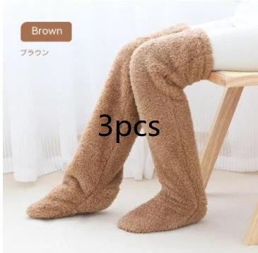 Mandotos cozy winter knee-high fuzzy socks designed for cold-proof comfort and warmth during cold weather.
