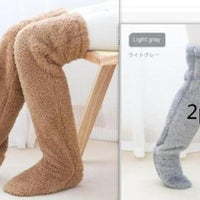 Mandotos cozy winter knee-high fuzzy socks for cold-proof comfort, featuring soft, warm fabric ideal for chilly weather.