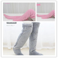 Mandotos cozy winter knee-high fuzzy socks, soft and warm for cold-proof comfort, ideal for chilly weather.