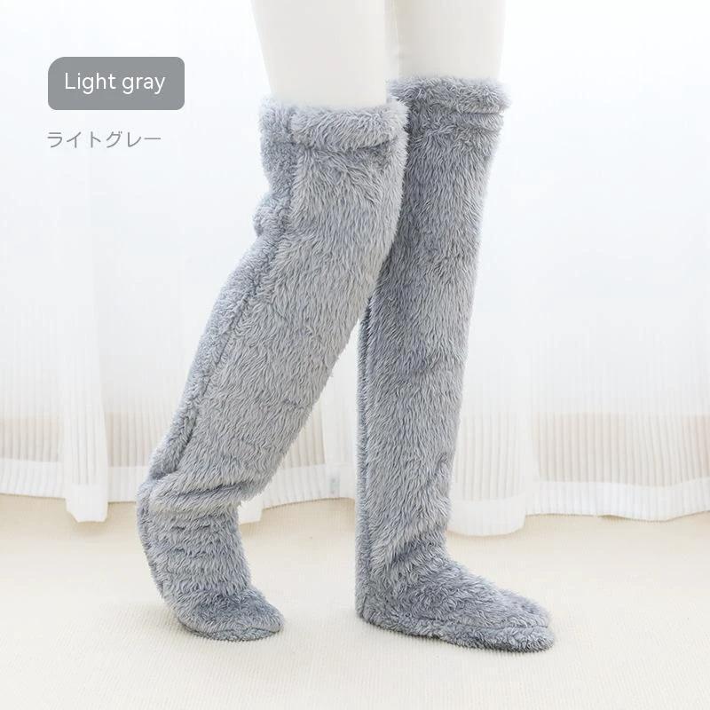Mandotos cozy winter knee-high fuzzy socks with warm, soft fabric designed for cold-proof comfort.