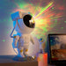 Mandotos creative astronaut galaxy starry sky projector nightlight USB bedroom table lamp displaying starry sky and galaxy patterns.