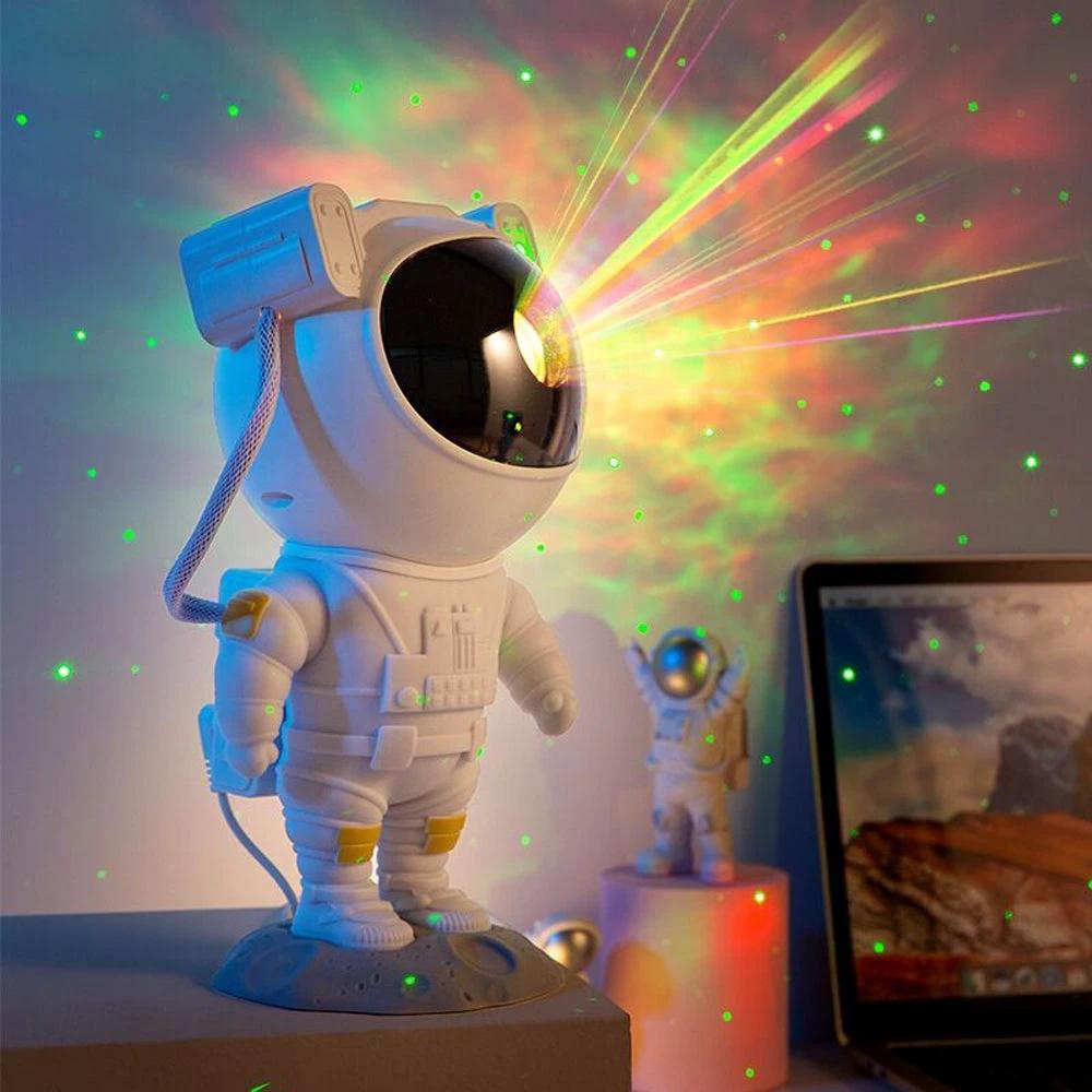 Mandotos creative astronaut galaxy starry sky projector nightlight USB bedroom table lamp displaying starry sky and galaxy patterns.