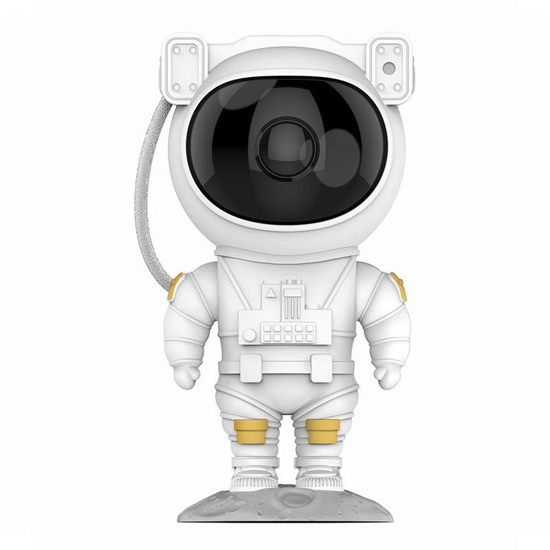 Mandotos astronaut galaxy starry sky projector nightlight illuminating a bedroom with USB-powered atmospheric lighting.