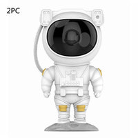 Mandotos creative astronaut galaxy starry sky projector nightlight USB bedside table lamp illuminating a starry sky for bedroom ambiance.