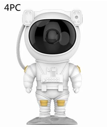 Mandotos astronaut galaxy starry sky projector nightlight displaying colorful stars and planets in a bedroom atmosphere.