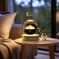 Mandotos crystal ball cosmic dinosaur indoor night light with USB power, warm glow for bedside or birthday gift ambiance.
