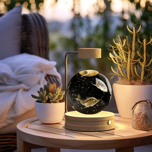 Mandotos cosmic dinosaur crystal ball indoor night light with warm USB-powered glow, ideal as a bedside or birthday gift lamp.