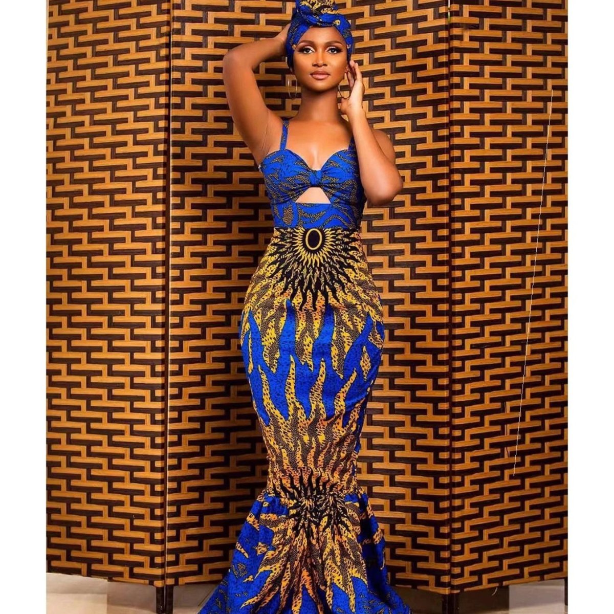 Mandotos digital print fishtail dress featuring vibrant patterns and a fitted silhouette, perfect for stylish occasions.