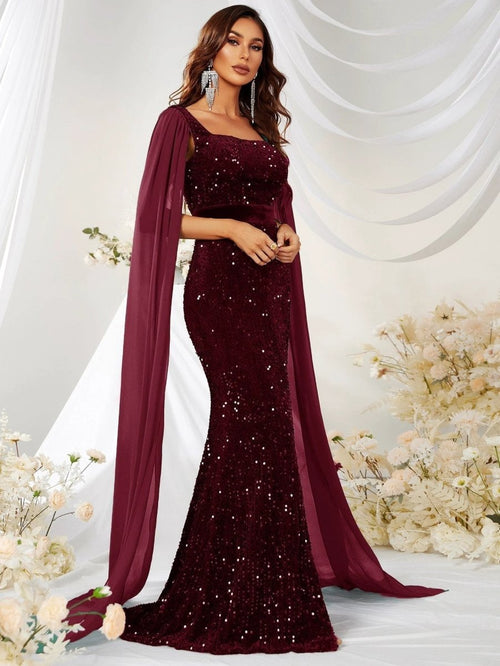 Mandotos sequin mesh fishtail dress with split design, elegant evening gown featuring a fitted silhouette and shimmering details.