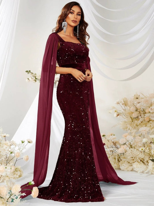 Mandotos sequin mesh fishtail dress with split design, elegant evening gown featuring a fitted silhouette and shimmering details.