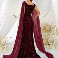 Mandotos sequin mesh fishtail dress with split design, elegant evening dress featuring a fitted silhouette and shimmering details.