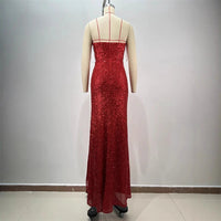 Drop-shaped diamond red paillette tube coat and dress by MANDOTOS, featuring a sexy low-cut, high slit design with shimmering embellishments.