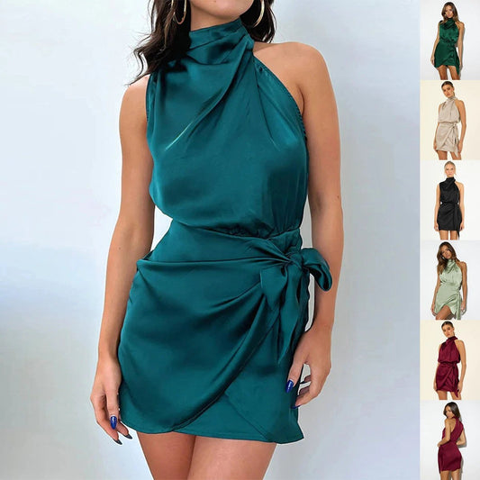 Mandotos elegant sleeveless halter neck dress with waist tie, perfect for evening parties and stylish women’s fashion.