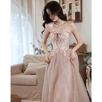 Mandotos elegant tube lace sequined ball gown, perfect for pageantry and prom, showcasing intricate lace and shimmering sequins.