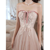 Elegant MANDOTOS tube lace sequined ball gown, perfect for prom, pageantry, or formal events, with a flowing silhouette and intricate details.