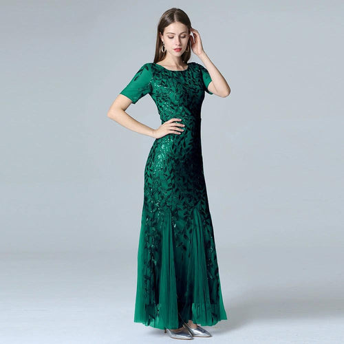 Elegant MANDOTOS evening dress in black with a flowing silhouette and sleeveless design, perfect for formal occasions.