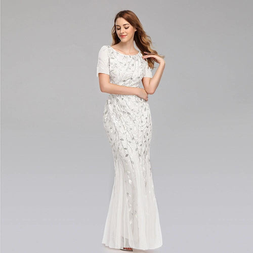 Mandotos evening dress in elegant black fabric with a flowing design, perfect for formal occasions.