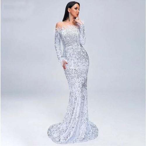 Elegant black evening dress by MANDOTOS featuring a fitted silhouette and stylish design for formal occasions.