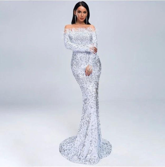 Elegant MANDOTOS evening dress featuring a flowing fabric and sophisticated design, perfect for formal occasions.