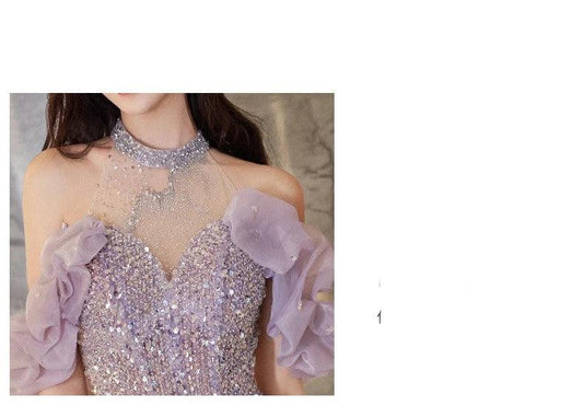 Women's halter evening gown by MANDOTOS, French style, flowing fabric, elegant design suitable for formal occasions