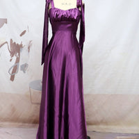 Mandotos sleeveless camisole gown, elegant evening bridesmaid dress for women, featuring a flowing design and stylish silhouette.