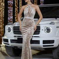 Mandotos velvet halter sheath evening dress with hollow-out design, suitable for banquets and formal occasions.