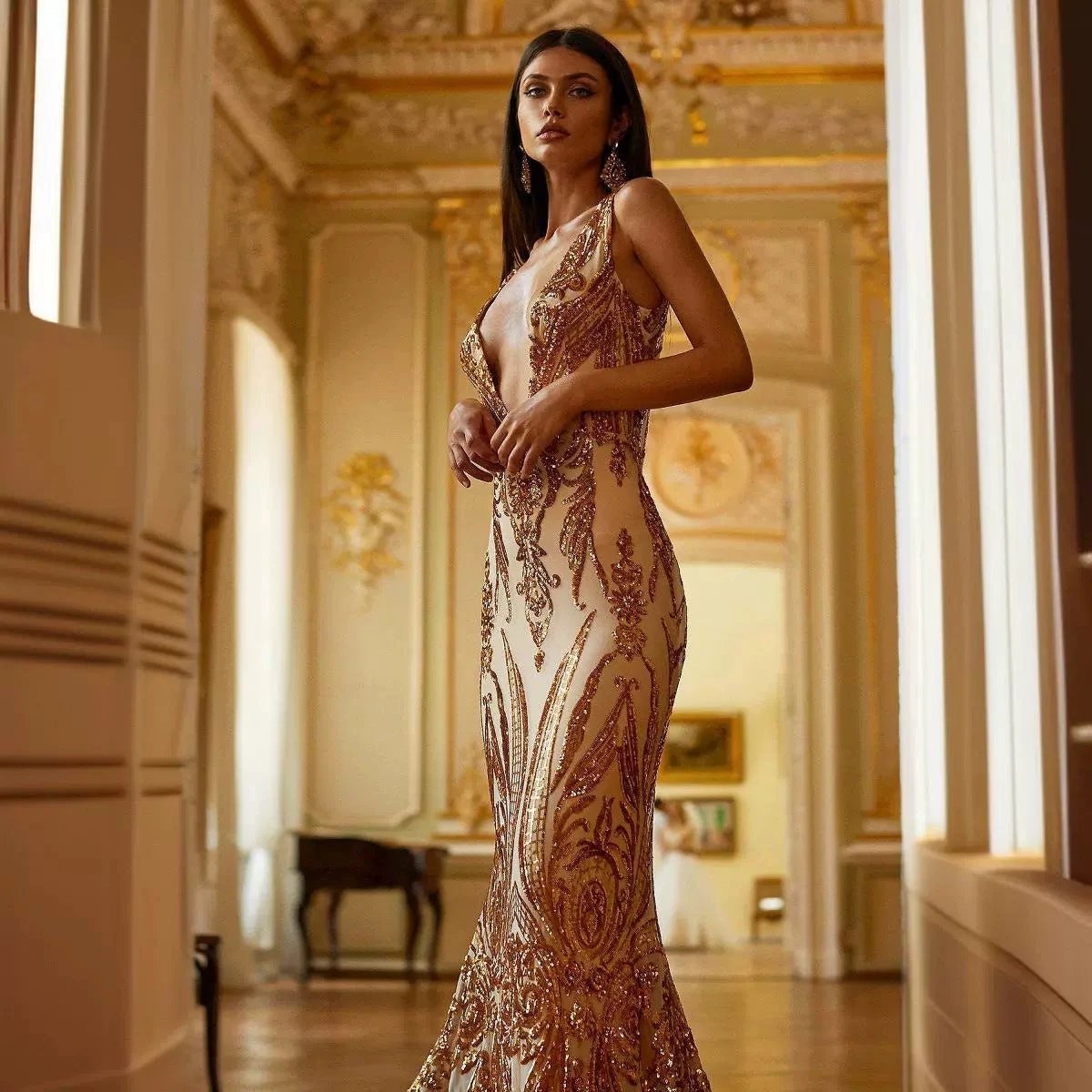 Female MANDOTOS creative V-neck heavy industry dress with unique design and fabric details, worn by a model in the image.