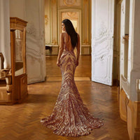 Female creative V-neck heavy industry dress by MANDOTOS featuring a stylish design and modern silhouette.