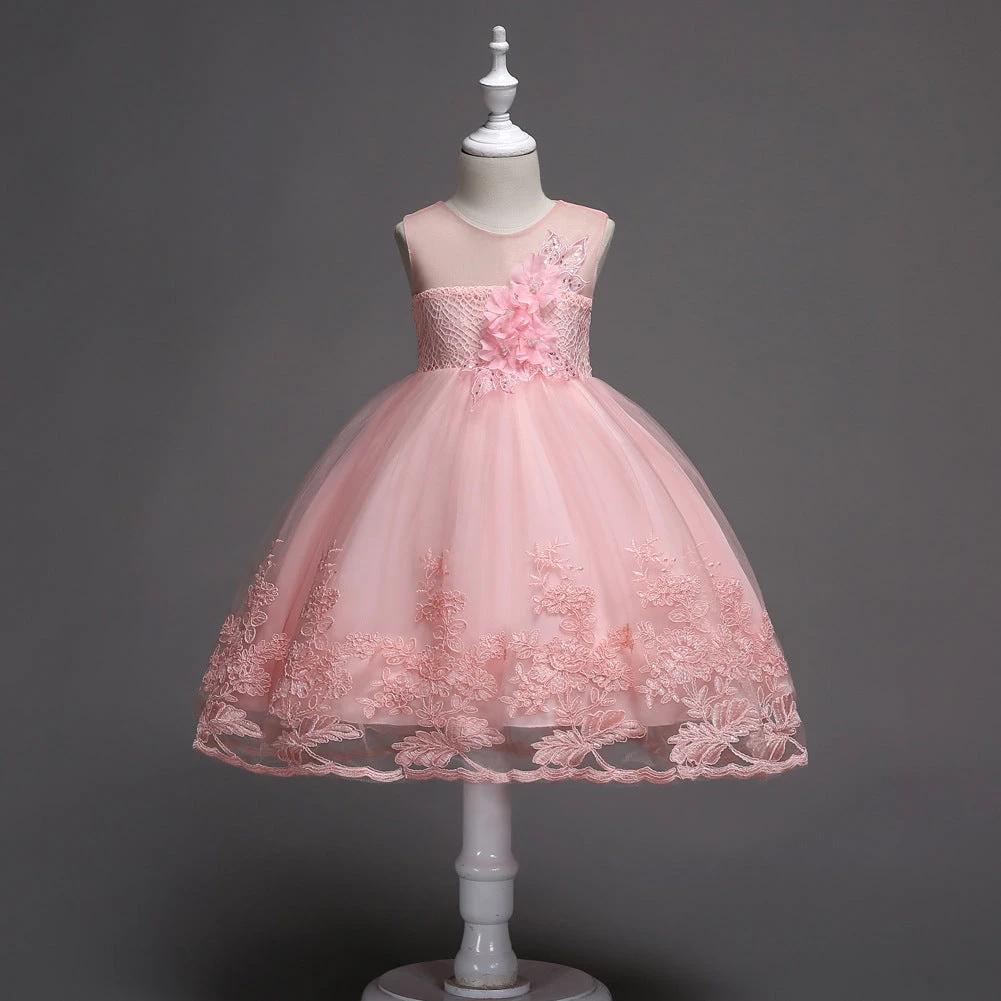 First Communion flower girl dress by Mandotos featuring lace trim, tulle fabric, and intricate bead embroidery.