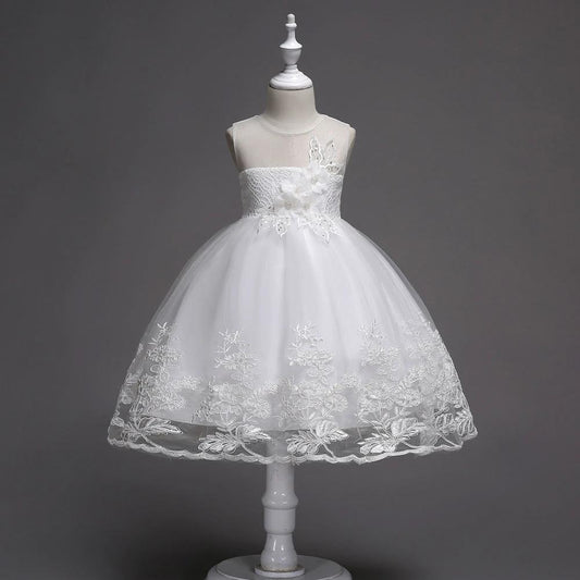 First Communion flower girl dress by Mandotos with lace trim, tulle fabric, and intricate bead embroidery.