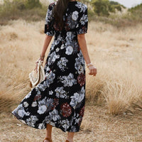 Mandotos floral summer beach dress with V-neck and elastic waist, ideal for women relaxing at the beach or casual outings.