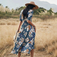 Mandotos floral summer beach dress for women with V-neck and elastic waist, lightweight and flowy for warm weather.
