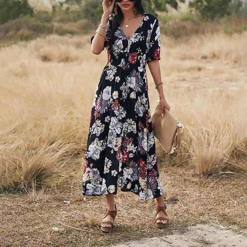 Mandotos floral summer beach dress for women featuring a V-neck and elastic waist, perfect for warm-weather outdoor wear.
