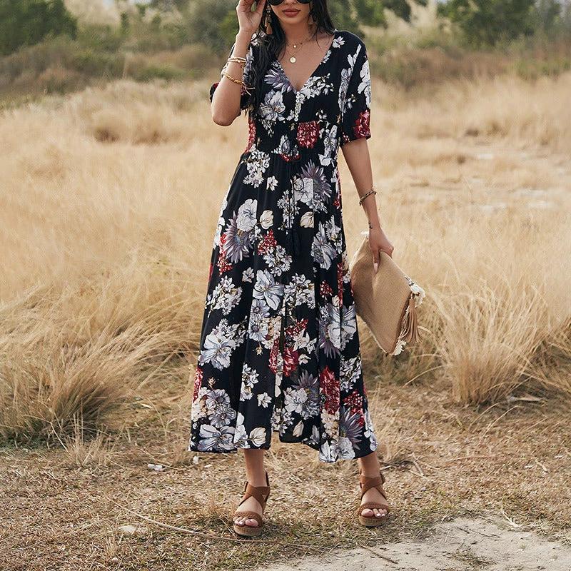 Mandotos floral summer beach dress for women featuring a V-neck and elastic waist, perfect for warm-weather outdoor wear.