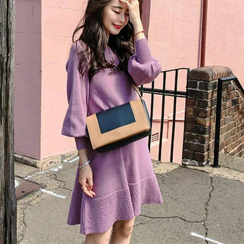 Mandotos French style orange sweater skirt for fall and winter, cozy knit design with a fitted silhouette.
