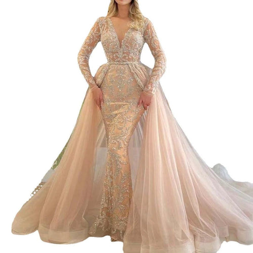 Elegant French style long-sleeved wedding dress by MANDOTOS featuring a simple, flowing design and classic silhouette.