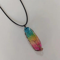 Mandotos stone crystal pillar Tree of Life pendant necklace, stylish jewelry with intricate design and natural gemstone details.