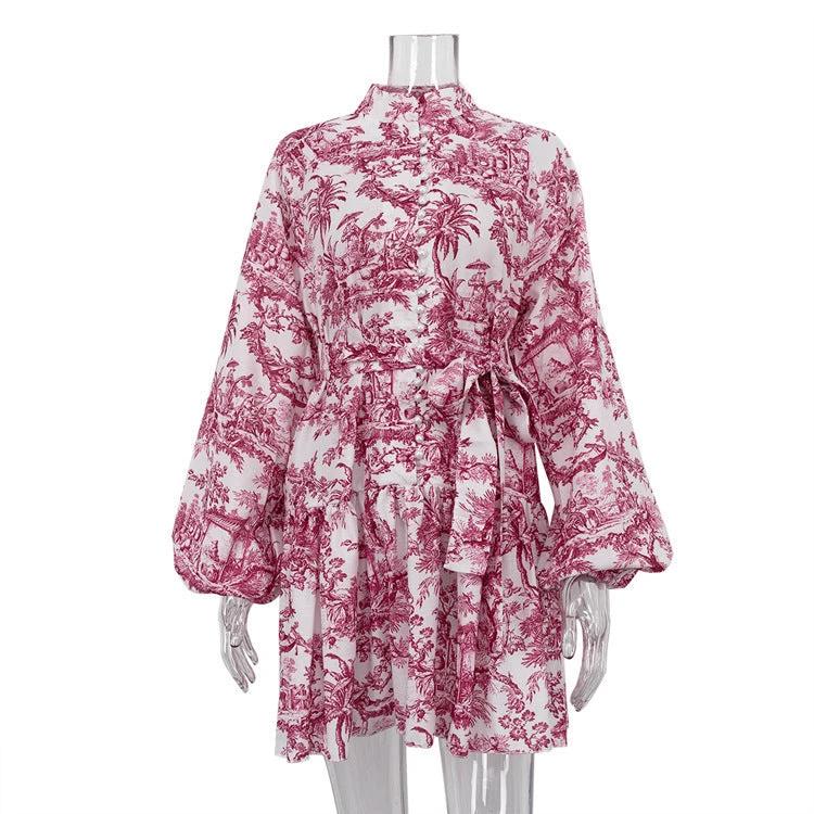 Mandotos ink print long sleeve short dress with puffy sleeves, lapel collar, and A-line silhouette on model.