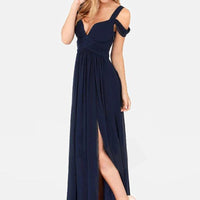 Elegant Greek style pleated long floor-length dress by MANDOTOS, featuring flowing fabric and sophisticated design.