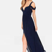 Long floor-length elegant Greek style pleated dress by MANDOTOS, featuring flowing fabric and intricate pleats for formal occasions.