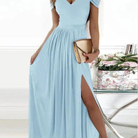 Elegant Greek style long pleated dress by MANDOTOS, floor-length with flowing fabric and intricate pleats for formal occasions.