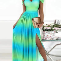 Elegant Greek style pleated long floor-length dress by MANDOTOS, showcased on a model with flowing fabric and classic design.
