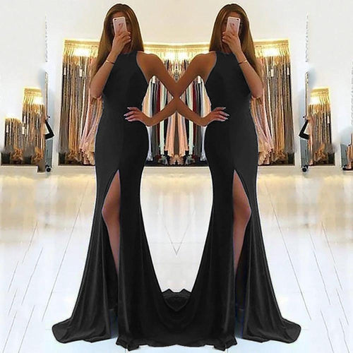 Long elegant ladies' evening dress by MANDOTOS, featuring a flowing fabric and formal design, suitable for special occasions.