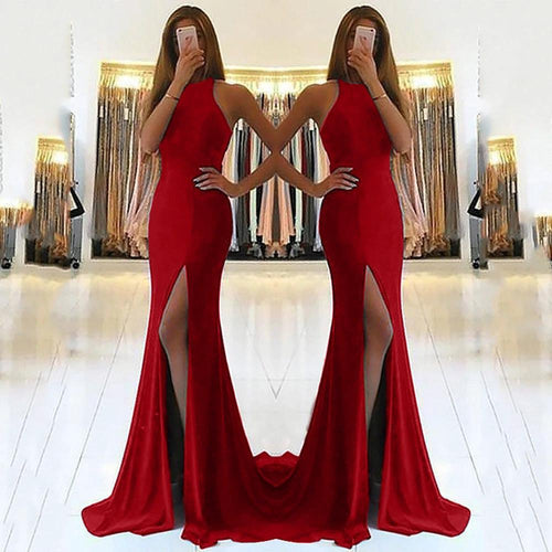 Elegant long ladies' evening dress by MANDOTOS, featuring a flowing design and sophisticated style suitable for formal occasions.