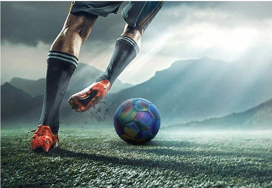 Mandotos luminous football with machine-stitched reflective surface, designed for visibility and durability during nighttime play.