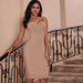 Mandotos beige bandage dress for women with evening strap, knee-length cocktail attire suitable for formal occasions.