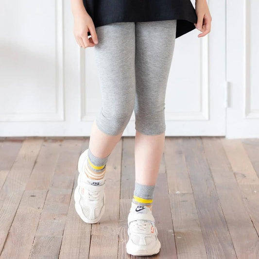 MANDOTOS cartoon irregular black graphic tee for kids with colorful bear back print and short sleeves.