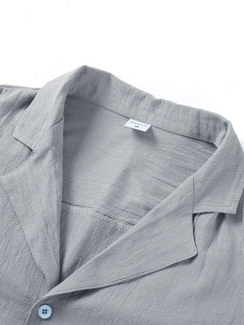 Men's casual beach shirt by MANDOTOS, short sleeve button-down style, lightweight fabric ideal for summer beachwear.
