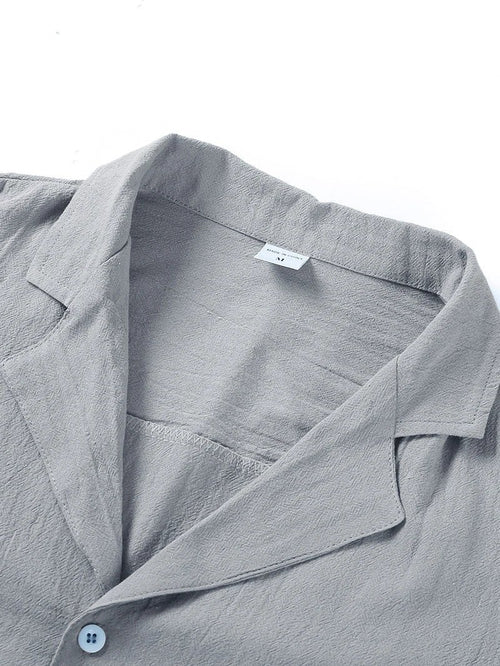 Men's casual beach shirt by MANDOTOS, short sleeve button-down style, lightweight fabric ideal for summer beachwear.